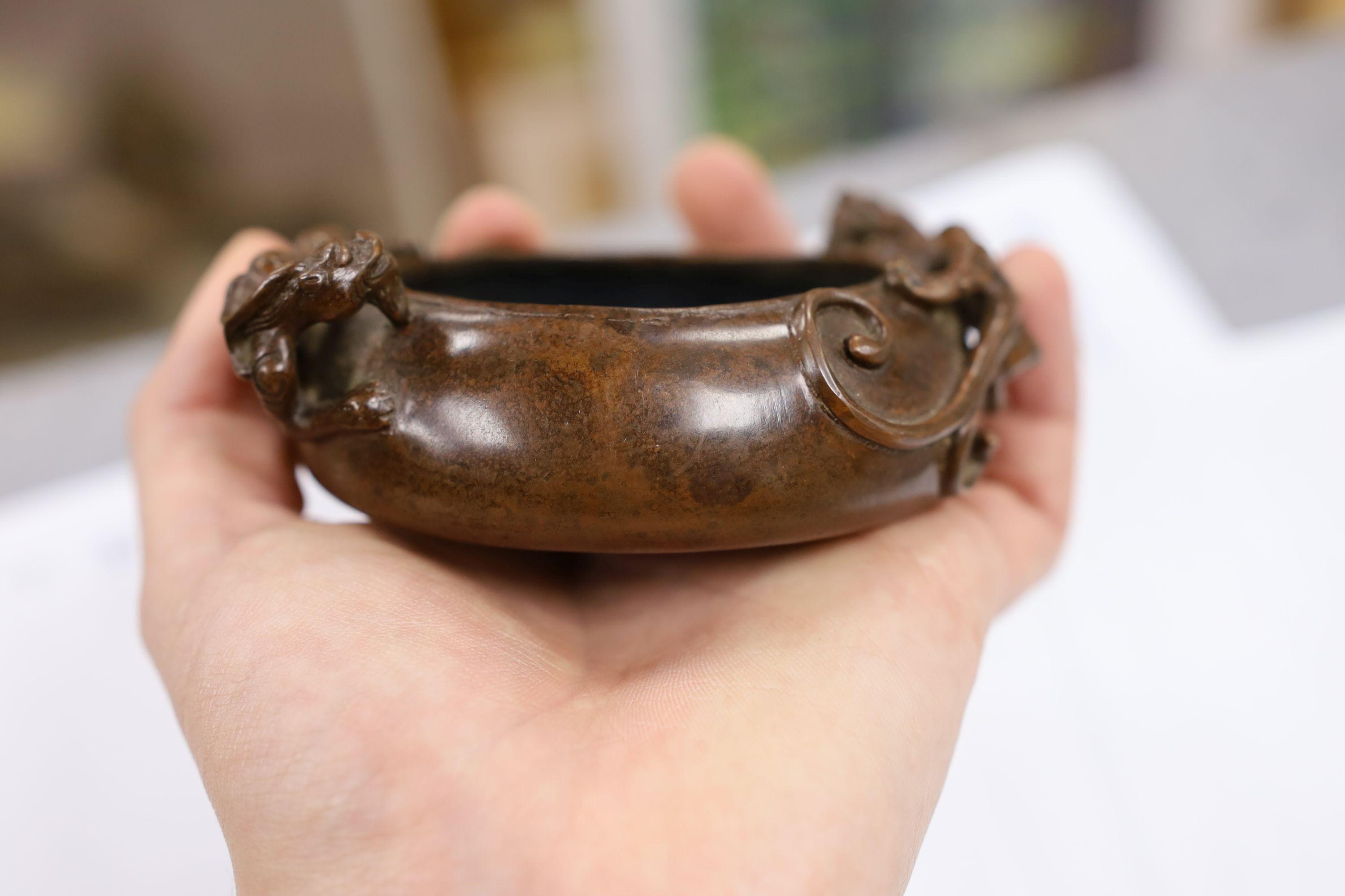 Two Chinese bronze censers, largest 11cms diameter